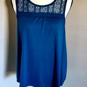 Sleeve less blouse with cris cross back